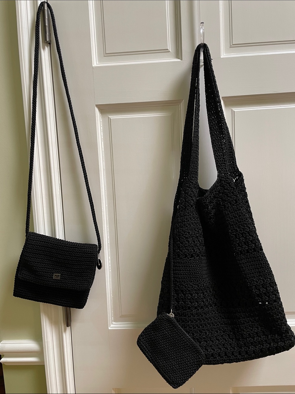The Sak Black Boho Shoulder Shopping Bag with a zippered change purse/